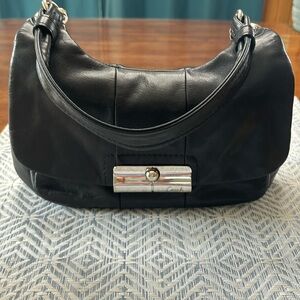 Black leather Coach purse.